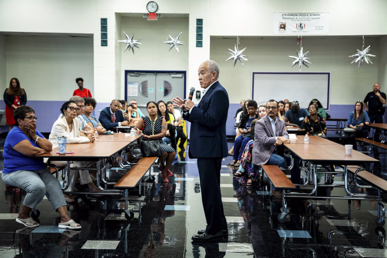 Mike Miles, the Houston Independent School District superintendent, giving a presentation to parents and teachers during a community meeting at Stevenson Middle School, in Houston on Aug. 1, 2023. As part of a state takeover plan, libraries in underperforming schools are becoming spaces for disruptive students to watch lessons on computers.