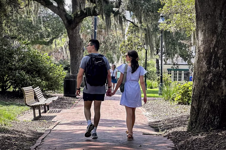 Image: People stroll through the space formerly known as Calhoun Square in Savannah, Ga., on Aug. 9, 2023. 