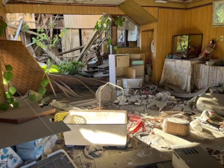 A house in the Japanese town of Futaba that has been left untouched since the day of the earthquake and tsunami.