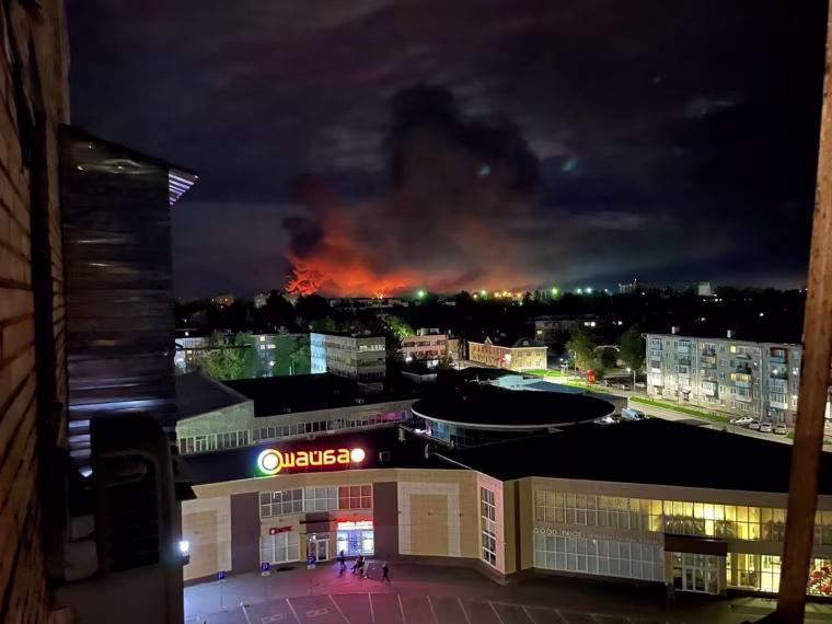 Smoke billows over the city of Pskov, Russia, on Tuesday night.