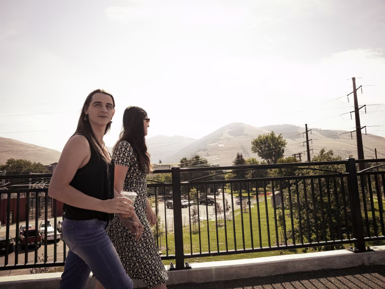 Rep. Zooey Zephyr and fiancé Erin Reed enjoy a stroll through downtown Missoula, Mont., on Aug. 9, 2023.