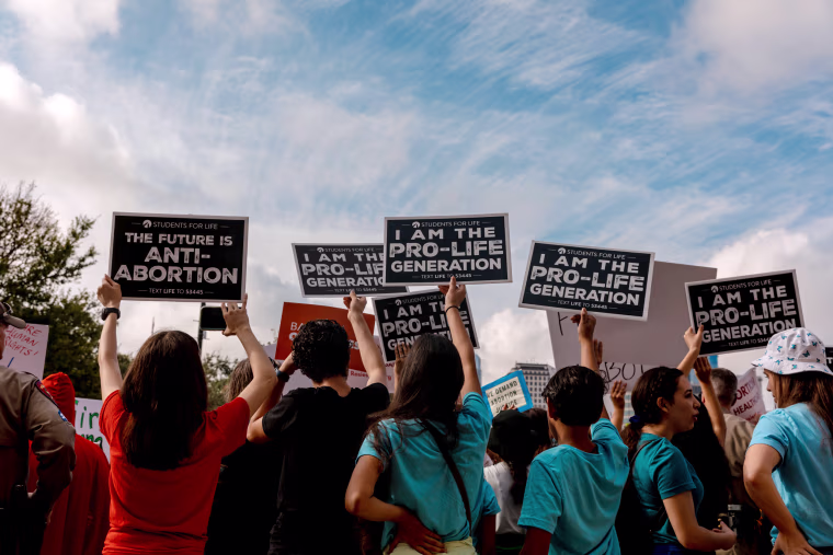 Demonstrators outside the Texas State Capitol during a Women's March in Austin, on Oct. 2, 2021.