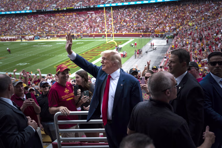 Donald Trump before the start a game between Iowa State University and the University of Iowa at Jack Trice Stadium in Ames, Iowa