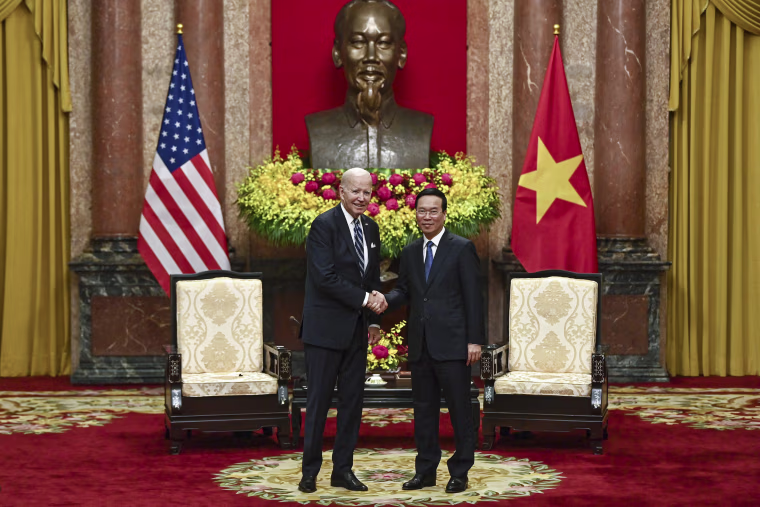 Joe Biden and Vo Van Thuong during a meeting at the Presidential Palace in Hanoi