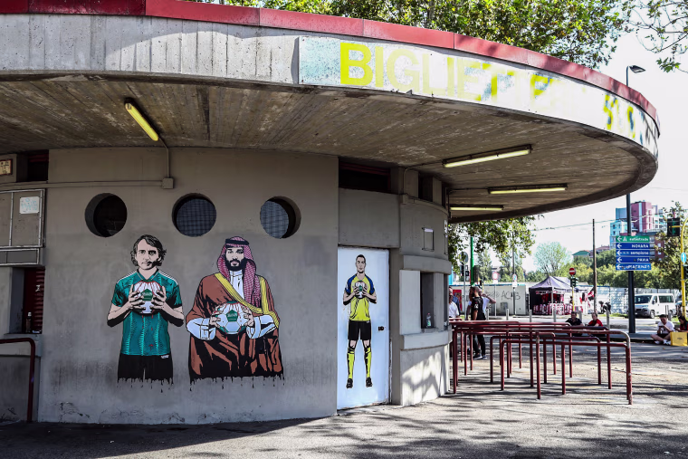 A mural depicting Roberto Mancini, Mohammed bin Salman and Cristiano Ronaldo painted by aleXsandro Palombo outside the San Siro Stadium before the UEFA Champions League match between AC Milan and Newcastle United FC at Stadio Giuseppe Meazza on Sept. 19, 2023 in Milan.
