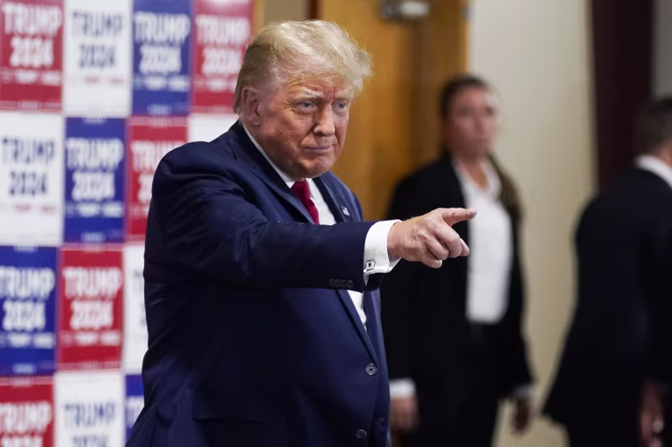 Former President Donald Trump arrives a rally in Maquoketa, Iowa