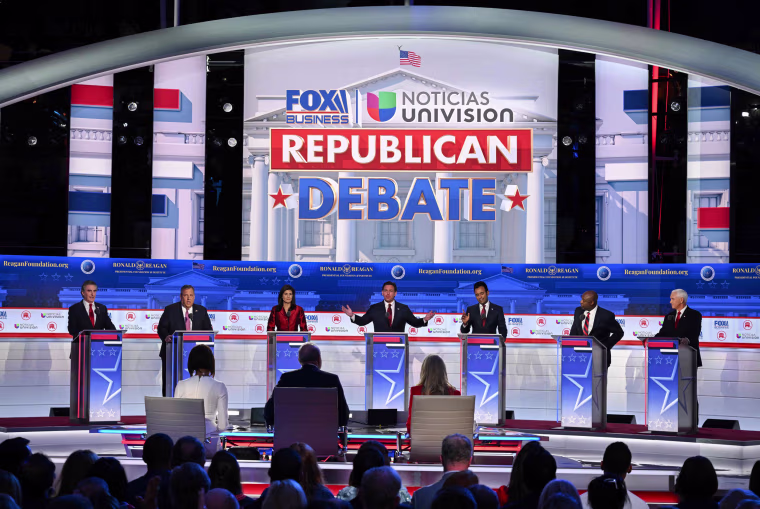 From left, Doug Burgum, Chris Christie, Nikki Haley, Ron DeSantis, Vivek Ramaswamy, Tim Scott and Mike Pence at the second Republican presidential primary debate in Simi Valley, Calif.,