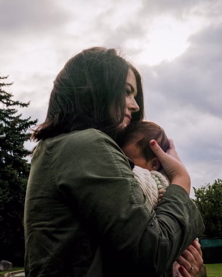 Laura Olin and her newborn daughter at City Beach Park in Sandpoint, Idaho, on Sept. 26.