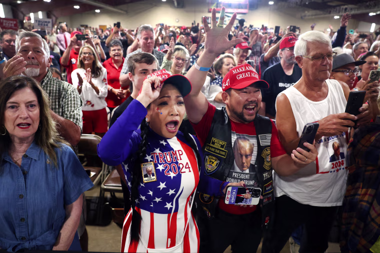 Supporters cheer President Donald Trump at the Jackson County Fairgrounds on Sept. 20, 2023, in Maquoketa, Iowa.