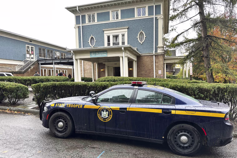 A New York State Police Department cruiser sits parked at Cornell University's Center for Jewish Living