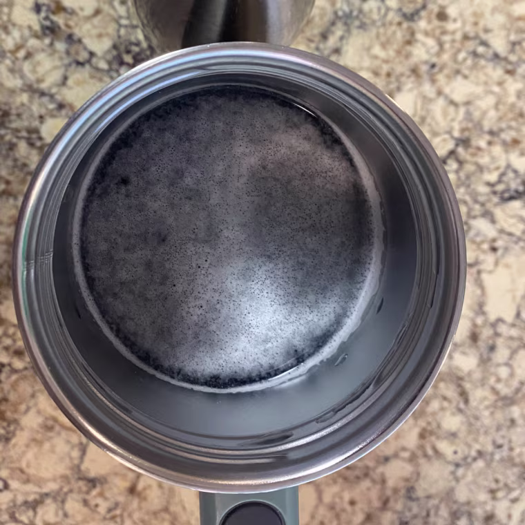After placing the tablet into the bottle, the water will begin to fizz.