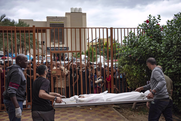 Palestinians struggle to bury their dead
