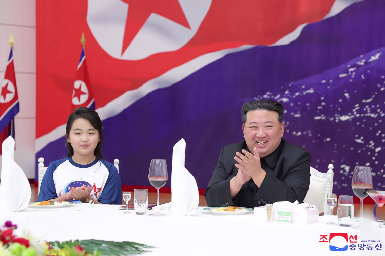Kim and daughter celebrate satellite launch in Pyongyang