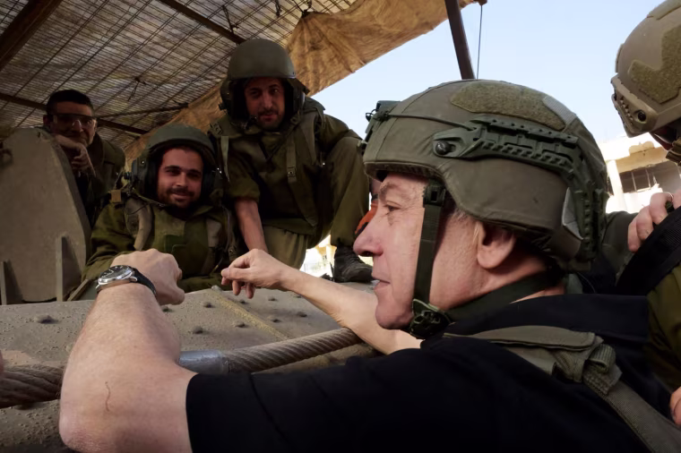 Israeli Prime Minister Benjamin Netanyahu on Sunday November 26, 2023 met with commanders and troops inside the Gaza Strip.