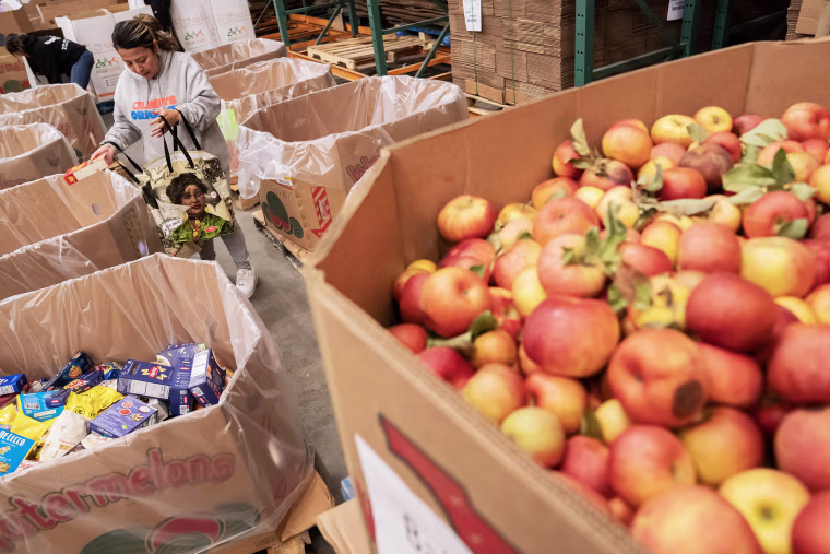 Food Packaging And Distribution At The Capital Area Food Bank Ahead Of Thanksgiving