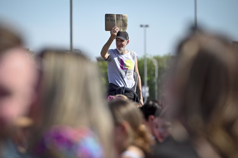 A man looking for a ticket outside a Taylor Swift concert at MetLife Stadium in East Rutherford, N.J., on May 26, 2023. 