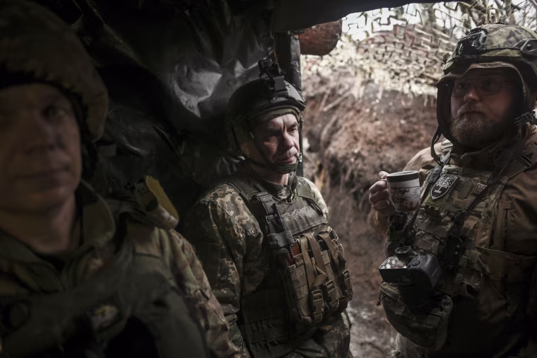 Donetsk Region, Ukraine: Ukrainian infantrymen of the 24th Mechanized Brigade man defensive trenches hundreds of meters from Russian military positions.