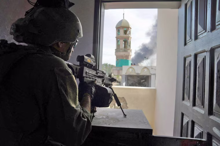 An Israeli soldier operating in the Gaza Strip in a photo released on Dec. 21, 2023.