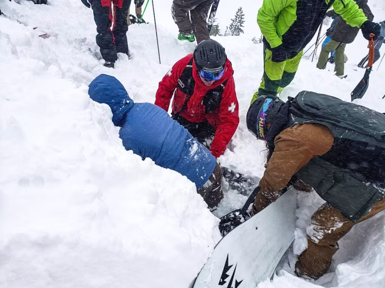 Jason Parker is dug out of the snow from the avalanche at Palisades Tahoe on Jan. 10, 2024.