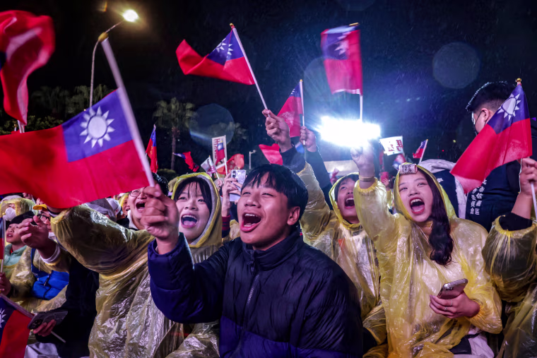Supporters attend a Kuomintang campaign rally ahead of Taiwan's presidential election in Taipe