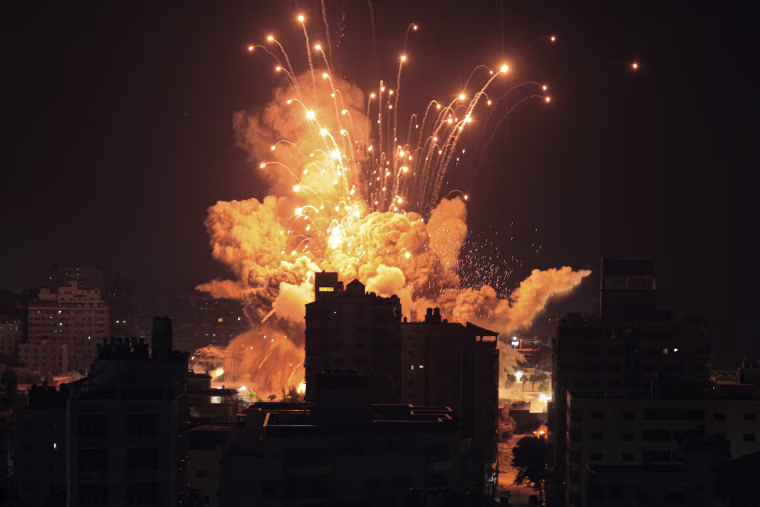 A missile explodes in Gaza City