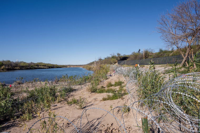 Razor wire is seen on the banks of the Rio Grande River at Shelby Park on January 12, 2024, in Eagle Pass, Texas.