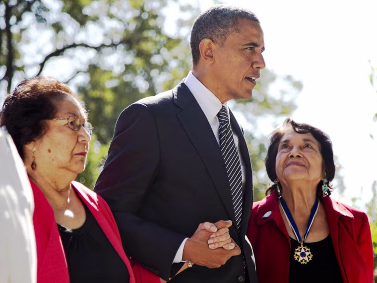 President Barack Obama walks with Cesar Chavez' widow Helen F. Chavez,  left, and Dolores Huerta, Co-Founder of the United Farm Workers, as they tour the Cesar E. Chavez National Monument Memorial Garden on Oct. 8, 2012, in Keene, Calif.