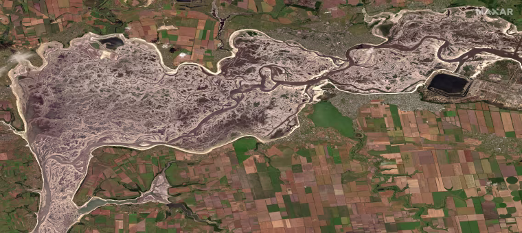 Satellite imagery from last June shows depleted water levels of the Dnieper River by the Zaporizhzhia nuclear power plant, following the destruction of the Khakovka dam.