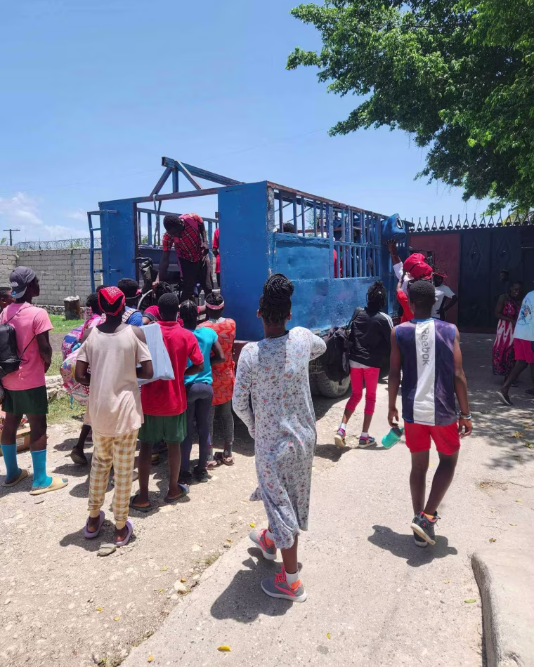 Children at the Black and White for Jesus Ministries’ shelter flee