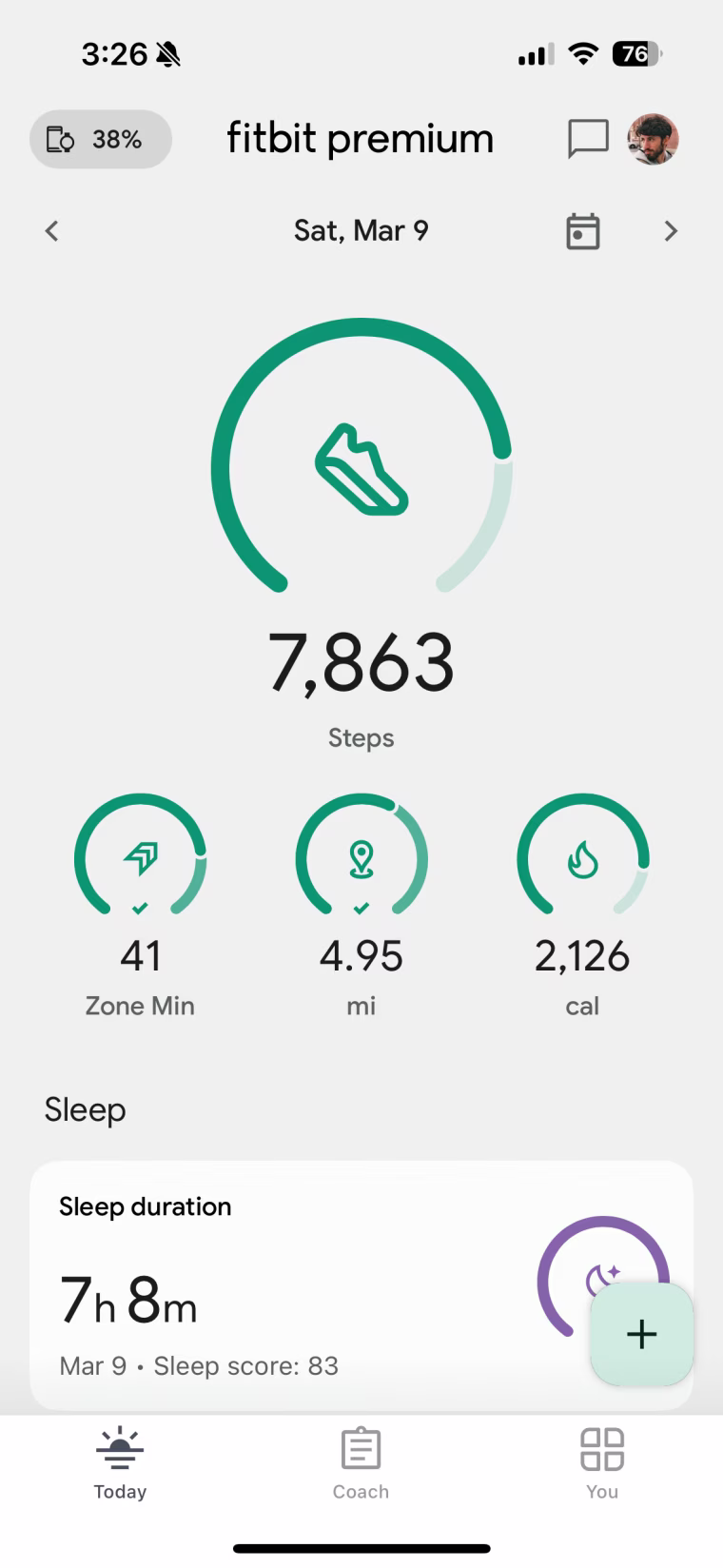 A video scroll of the Fitbit app home screen showing a summary of stats like steps, zone minutes, miles, calories burned, sleep score.