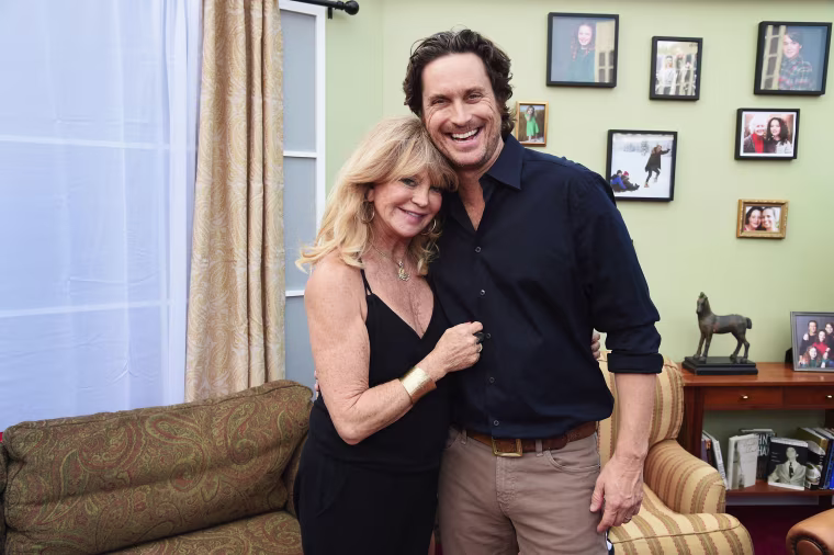 Oliver Hudson (R) and Goldie Hawn (L) attend "The Christmas Chronicles" Premiere on November 12, 2018 in Los Angeles, California.