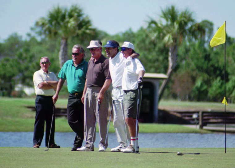 O.J. Simpson poses with unidentified members of his foursome