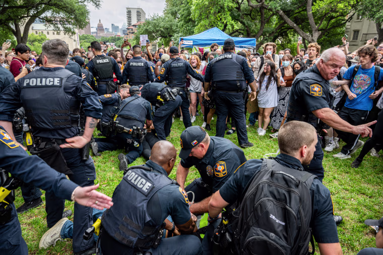 Police arrest protesters at a pro-Palestine demonstration.
