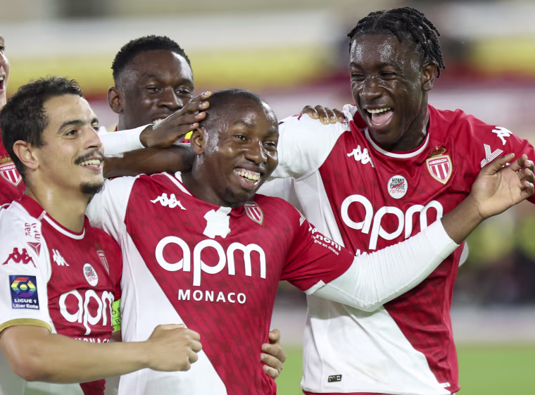 Monaco player Mohamed Camara, center, celebrating with teammates during a match against Nantes, in Monaco