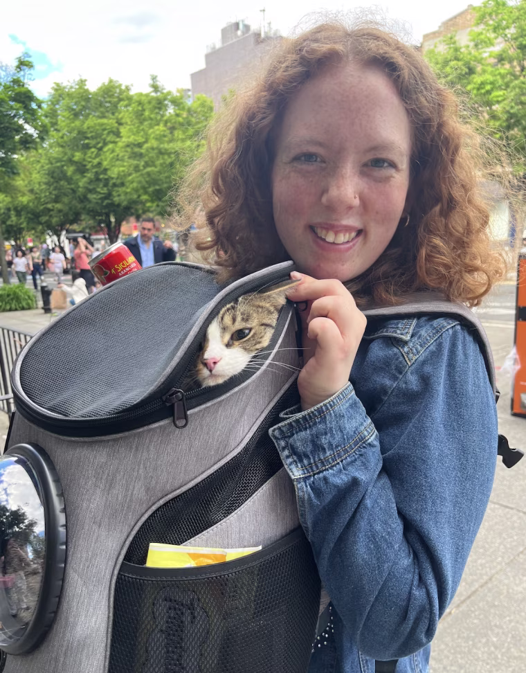 The Fat Cat Mini Backpack lets Kiwi see the world around him while keeping him safe.