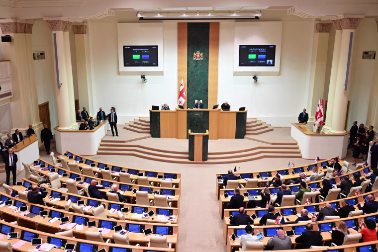 Georgia's parliament on Tuesday adopted a controversial "foreign influence" law, which has sparked weeks of mass protests and a blizzard of international condemnation. 
