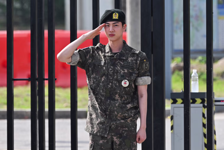K-pop megastar Jin from BTS was discharged from his South Korean military service on June 12, AFP reporters saw, the first member of the band to complete the mandatory duty, freeing him up to fully resume musical activities.