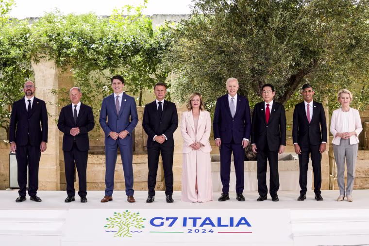 From left, Charles Michel, Olaf Scholz, Justin Trudeau, Emmanuel Macron, Giorgia Meloni, Joe Biden, Fumio Kishida, Rishi Sunak and Ursula von der Leyen.