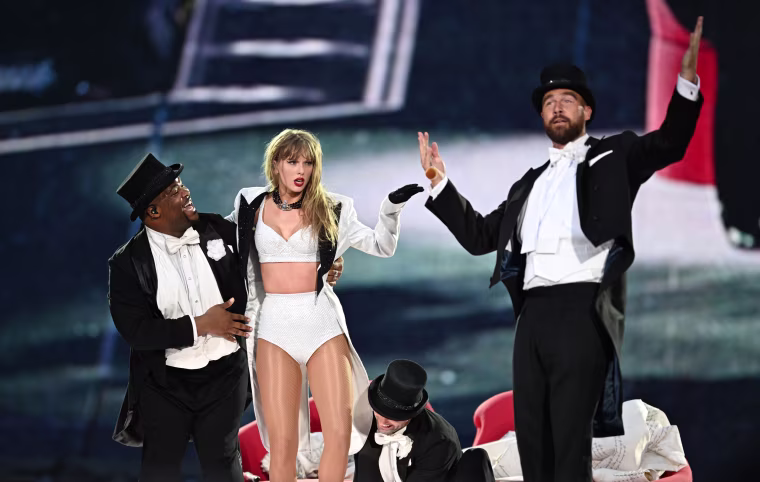 Taylor Swift is joined on stage by Travis Kelce