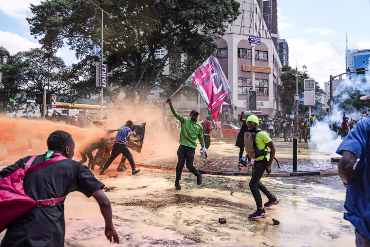 Protesters scatter as Kenya police spray water canons at them