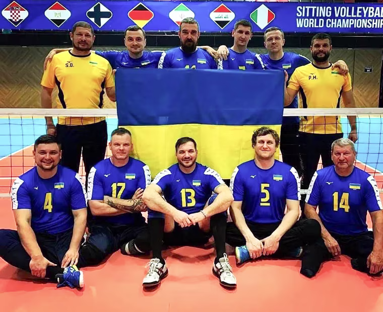 Dmytro Melnyk, wearing No. 13, with his Ukrainian teammates at the 2022 Sitting Volleyball World Championships in Sarajevo, Bosnia-Herzegovina.