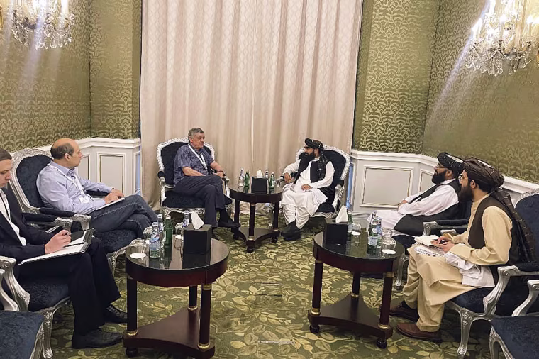 A Taliban delegation is attending a United Nations-led meeting in Qatar on Afghanistan after organizers said women would be excluded from the gathering. The two-day meeting is the third U.N.-sponsored gathering on the Afghan crisis. (Taliban Spokesman Office via AP)