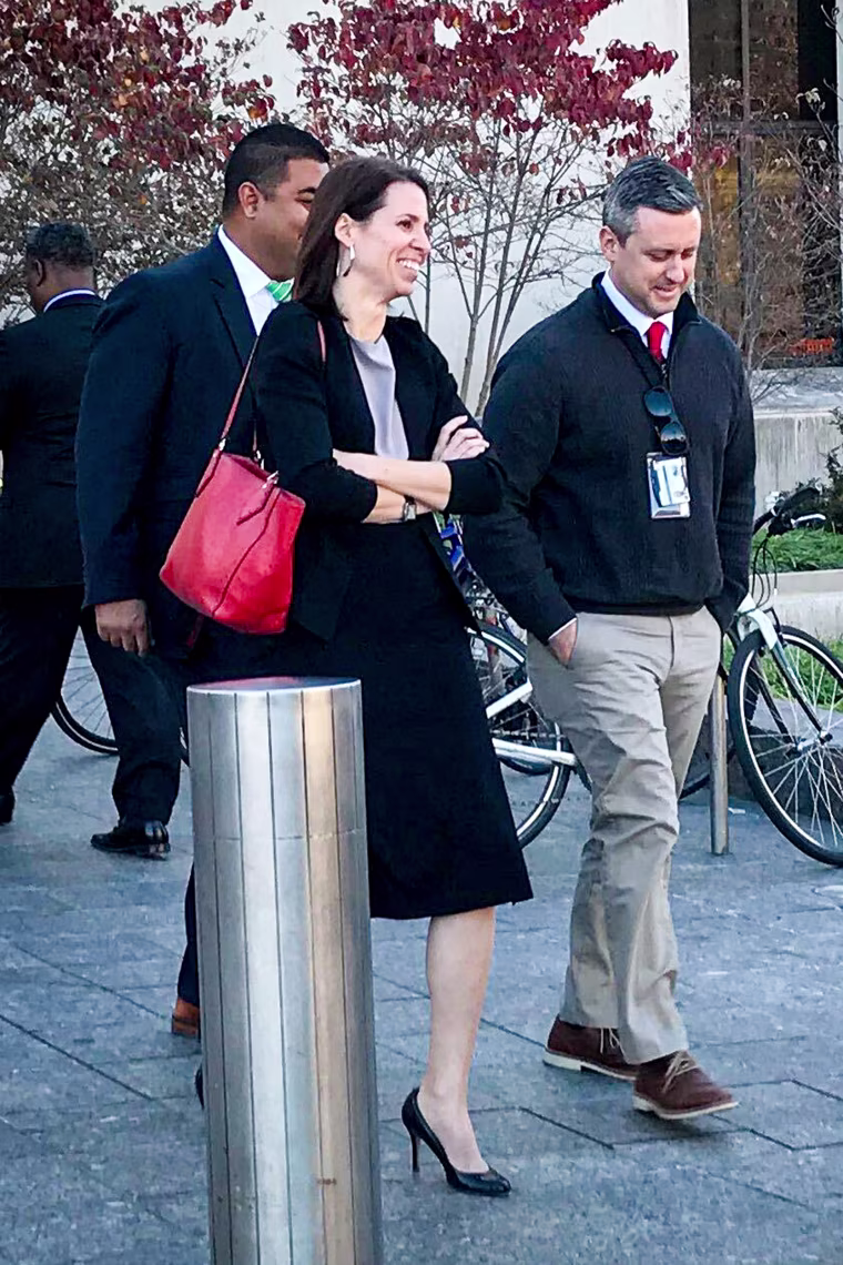 Assistant U.S. Attorney Jennifer Kerkhoff and MPD Detective Gregg Pemberton.