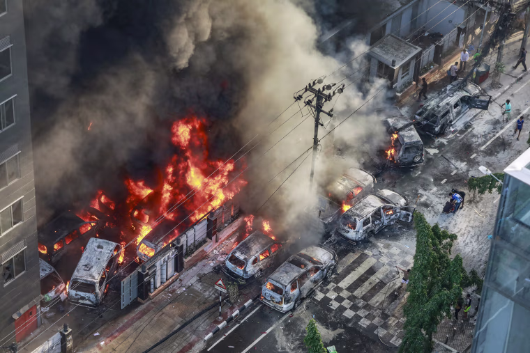 Bangladeshi students set fire to the country's state broadcaster on July 18, a day after Prime Minister Sheikh Hasina appeared on the network seeking to calm escalating clashes that have killed at least 32 people. 