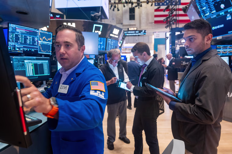 Traders work on the floor of the New York Stock Exchange on Aug. 5, 2024, in New York City.