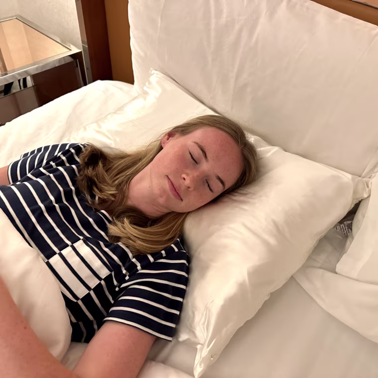 NBC News Group Intern Celia Funderbunk tries the Quince 100% Mulberry Silk Pillowcase in Ivory.