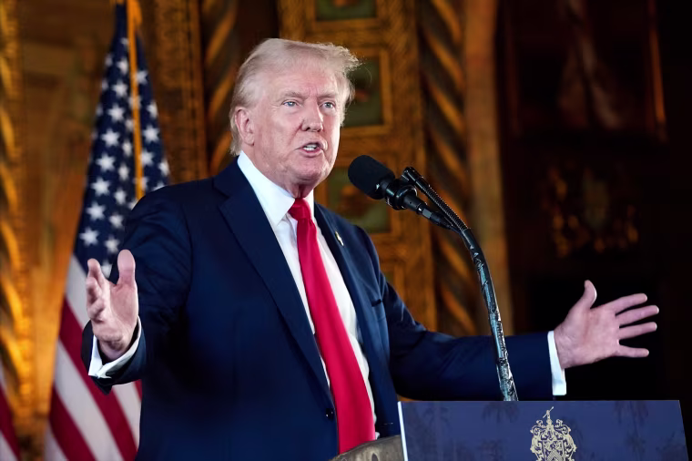 Donald Trump speaks to reporters