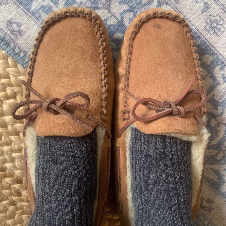 The Ugg Dakota slippers feature a rubber outsole.