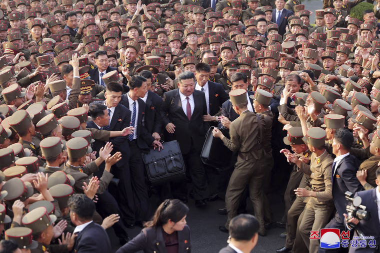 North Korean leader Kim Jong Un said his country will speed up steps toward becoming a military superpower with nuclear weapons and would not rule out using them if it came under enemy attack, state news agency KCNA said on Tuesday.