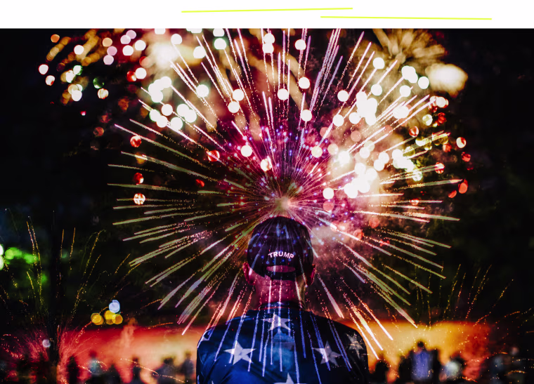 Double exposure of a man in a Trump hat and fireworks in the sky.